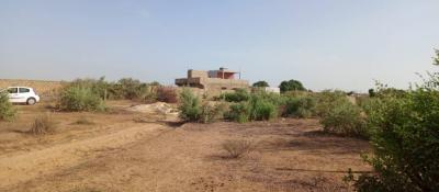 4 terrains jumeles de 225 metres carres a saly 